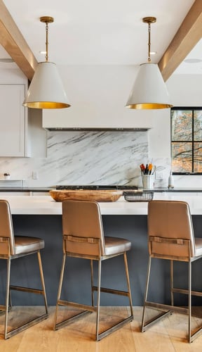 Stowe Woods kitchen with marble backsplash, island with bar stools, and wood beam ceiling